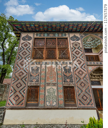 Exterior view of Shaki Khan's Palace showcasing intricate patterns in Shaki, Azerbaijan during daylight 117657879
