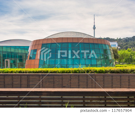 View of the International Mugham Center in Baku, Azerbaijan, with Baku TV Tower in the background 117657904