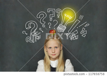 Adorable child girl student with yellow light bulb and question marks Adorable child girl student with yellow light bulb and question marks 117658758