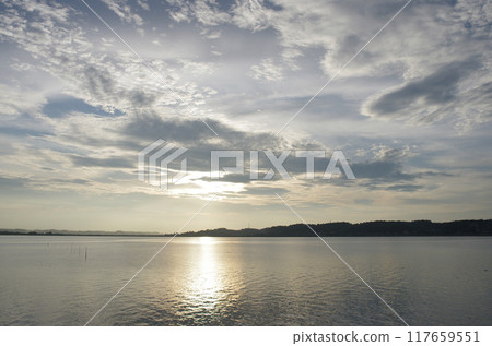 The Ramsar site of Hinuma. The endless crimson sky. The moment when the day quietly ends. The Ramsar site of Hinuma. The endless crimson sky. The moment when the day quietly ends. 117659551
