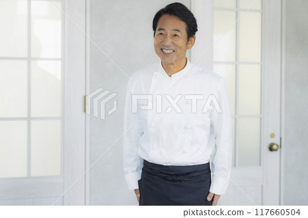 Owner chef, middle-aged man Owner chef, middle-aged man 117660504