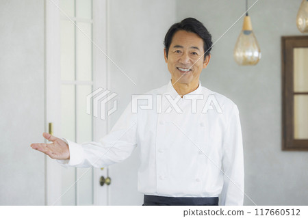 Owner chef, middle-aged man Owner chef, middle-aged man 117660512