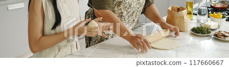 Family Baking Pie In The Kitchen Family Baking Pie In The Kitchen 117660667
