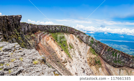 Mt. Io on a clear day, the explosion crater at the summit Mt. Io on a clear day, the explosion crater at the summit 117661385