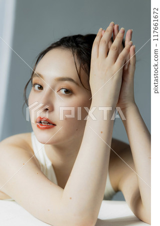 Portrait of a woman in a black dress Portrait of a woman in a black dress 117661672