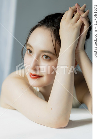 Portrait of a woman in a black dress 117661673