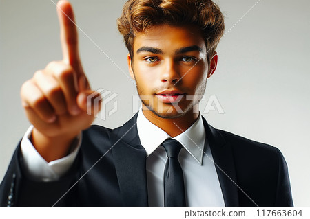 Businessman pointing upwards with confident little smile. focus on finger Businessman pointing upwards with confident little smile. focus on finger 117663604