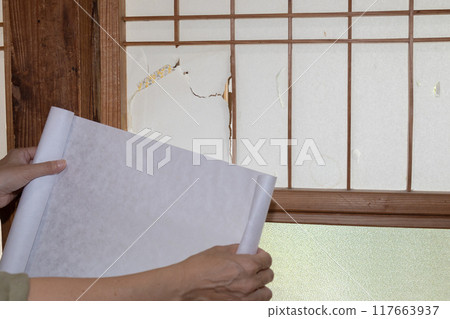 They are trying to replace the torn shoji screens. 117663937