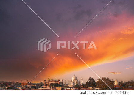 Taj Mahal in Agra, Uttar Pradesh, India. sunrise sky above Fabulous Taj mahal travel concept. indian islamic heritage at sunrise early morning . Taj Mahal in Agra, Uttar Pradesh, India. sunrise sky above Fabulous Taj mahal travel concept. indian islamic heritage at sunrise early morning . 117664391