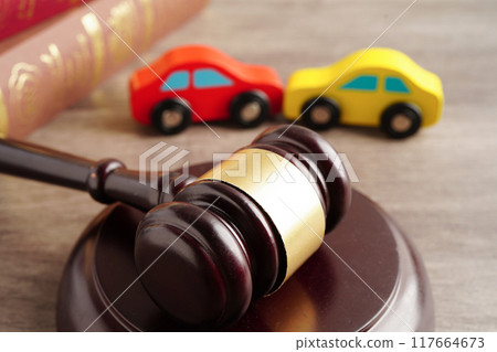 Car accident lawsuit and insurance, Judge hammer with car model. 117664673