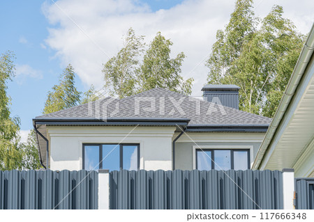 Shingles texture - close up view of asphalt roofing shingles Shingles texture - close up view of asphalt roofing shingles 117666348