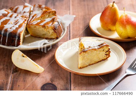 Pear pie. Homemade cake. Fruit dessert on a plate.  117666490