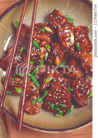 yakitori chicken kebab, on a plate, with green onions and sesame seeds, top view, no people, yakitori chicken kebab, on a plate, with green onions and sesame seeds, top view, no people, 117666754