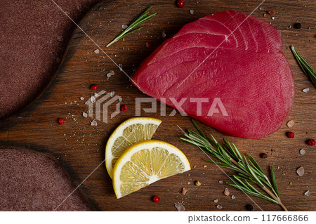 fresh red tuna fillet, for steak, raw, top view, on a cutting board, no people, 117666866