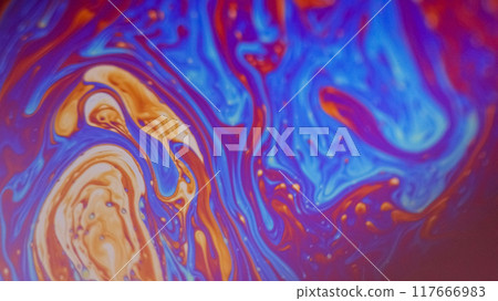 Blur psychedelic fluid. Paint mix. Defocused orange pink blue color spectrum oil dye droplets flow abstract art background. 117666983