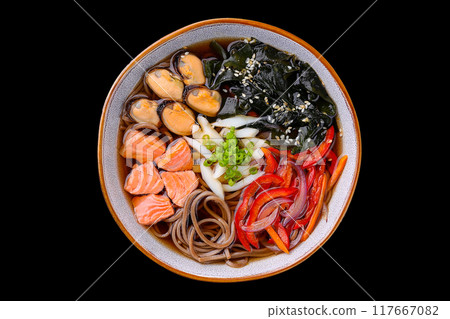 Asian style soup on black background in beautiful dishes 117667082