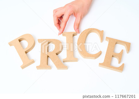 Wooden alphabet blocks arranged with the word "PRICE" 117667201