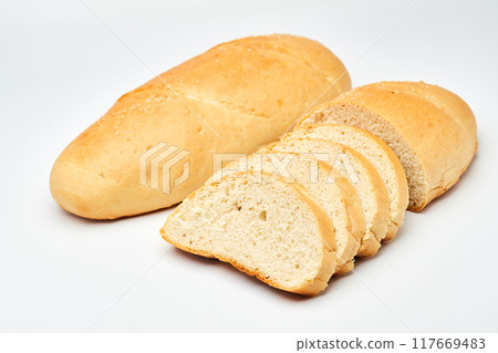 Freshly baked white bread loaf, sliced and ready to serve, perfect for sandwiches and breakfast Freshly baked white bread loaf, sliced and ready to serve, perfect for sandwiches and breakfast 117669483