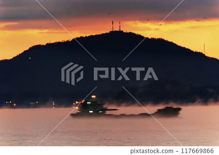 Sunrise over Setouchi with sea mist flowing 117669866