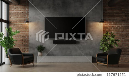 A modern loft-style living room with a flat-screen TV on a brick wall, surrounded by industrial-style decor. 117671251