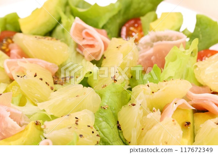 Healthy salad with pomelo, prosciutto and avocado Healthy salad with pomelo, prosciutto and avocado 117672349
