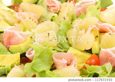 Healthy salad with pomelo, prosciutto and avocado Healthy salad with pomelo, prosciutto and avocado 117672350
