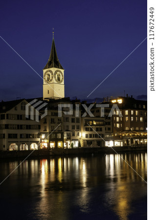 sunset scenic view of historic Zurich city center with famous Fraumunster and river Limmat at Lake Zurich,Switzerland 117672449