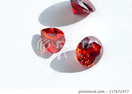 Red Ruby gemstone isolate on white background, close up shot 117672477