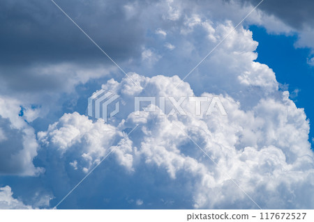Summer cumulonimbus clouds covering the blue sky b-1 Summer cumulonimbus clouds covering the blue sky b-1 117672527