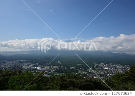 Mount Fuji with its head above the clouds, seen from Tenjoyama Park Mount Fuji with its head above the clouds, seen from Tenjoyama Park 117673624