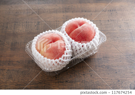 Peaches in fruit caps Peaches in fruit caps 117674254