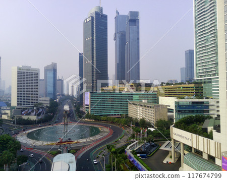 Aerial view of Bundaran HI, a bustling roundabout in Jakarta, Indonesia. 117674799