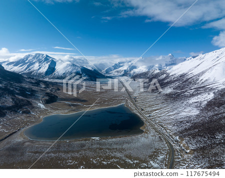 Aerial view of beautiful snow mountains and lake in Tibet,China 117675494