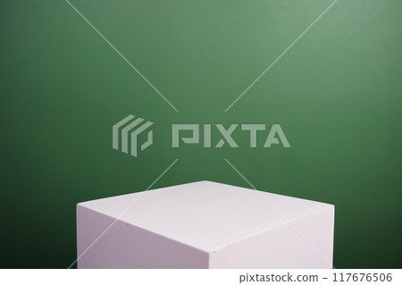 White podium display scene stage showcase front view with copy space on green background 117676506