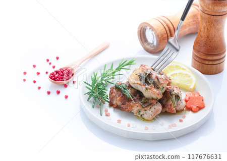 Grilled chicken thighs with herbs (rosemary, sage, basil) Grilled chicken thighs with herbs (rosemary, sage, basil) 117676631