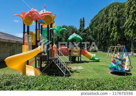Kid Playgrounds on green grass field in garden and blue sky 117678398