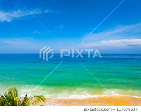 Beautiful sea beach and waves texture in sunny summer day background 117679637