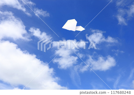 Paper plane flying in the sky 117680248