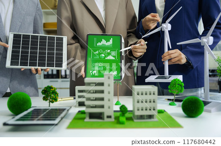 Engineer Teamwork Meeting, with partner on model building at company office working technology, Renewable energy-based green businesses and global warming. 117680442