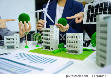 Engineer Teamwork Meeting, with partner on model building at company office working technology, Renewable energy-based green businesses and global warming. Engineer Teamwork Meeting, with partner on model building at company office working technology, Renewable energy-based green businesses and global warming. 117680448