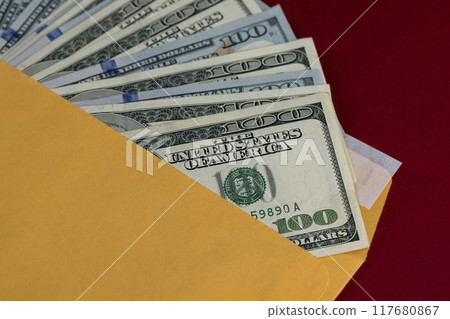 new yellow paper envelopes with American dollars 117680867