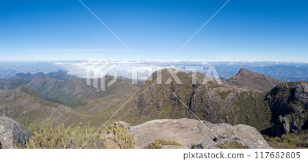 Majestic Mountain Peaks Above the Clouds Panorama Majestic Mountain Peaks Above the Clouds Panorama 117682805