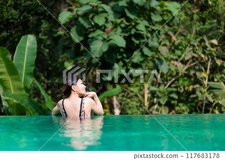 Japanese woman in swimsuit at the pool 117683178
