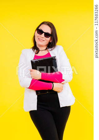 Young fat plus size woman hold laptop pc computer. Body positive concept Young fat plus size woman hold laptop pc computer. Body positive concept 117683266