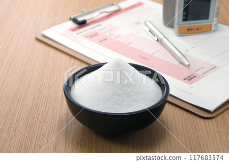 Salt on a plate High blood pressure image 117683574
