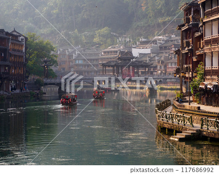 Fenghuang Ancient Town. Located in Fenghuang County. Southwest of HuNan Province, China. Fenghuang is a popular tourist destination of Asia. 117686992