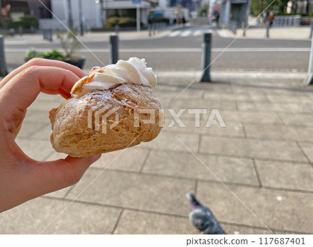 Double cream puff with whipped cream and custard Double cream puff with whipped cream and custard 117687401