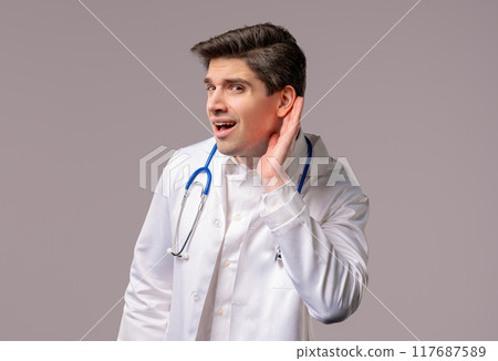 Curious doctor man doesn't hear. Whisper quiet sound, deaf, misunderstand Curious doctor man doesn't hear. Whisper quiet sound, deaf, misunderstand 117687589