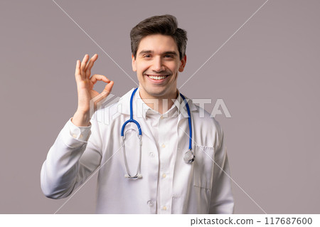 Positive doctor man with OK, okay hand sign gesture. Happy medical, physician Positive doctor man with OK, okay hand sign gesture. Happy medical, physician 117687600