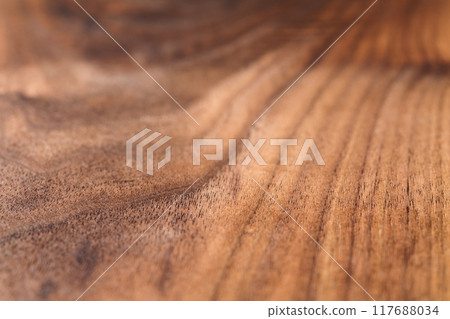 Angle closeup shot of black walnut wood surface Angle closeup shot of black walnut wood surface 117688034